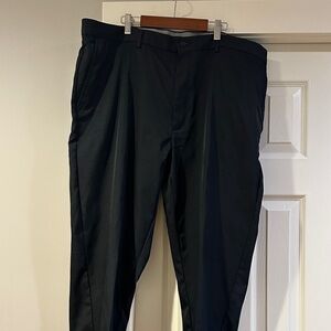 Greg Norman performance black slacks for golf or work